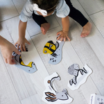 Strapabíró kartonból készült baba kirakó játék